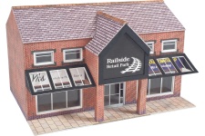N scale self assembly card kit of a modern retail unit